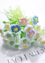 Crocheted flower bouquet, pastel colors.