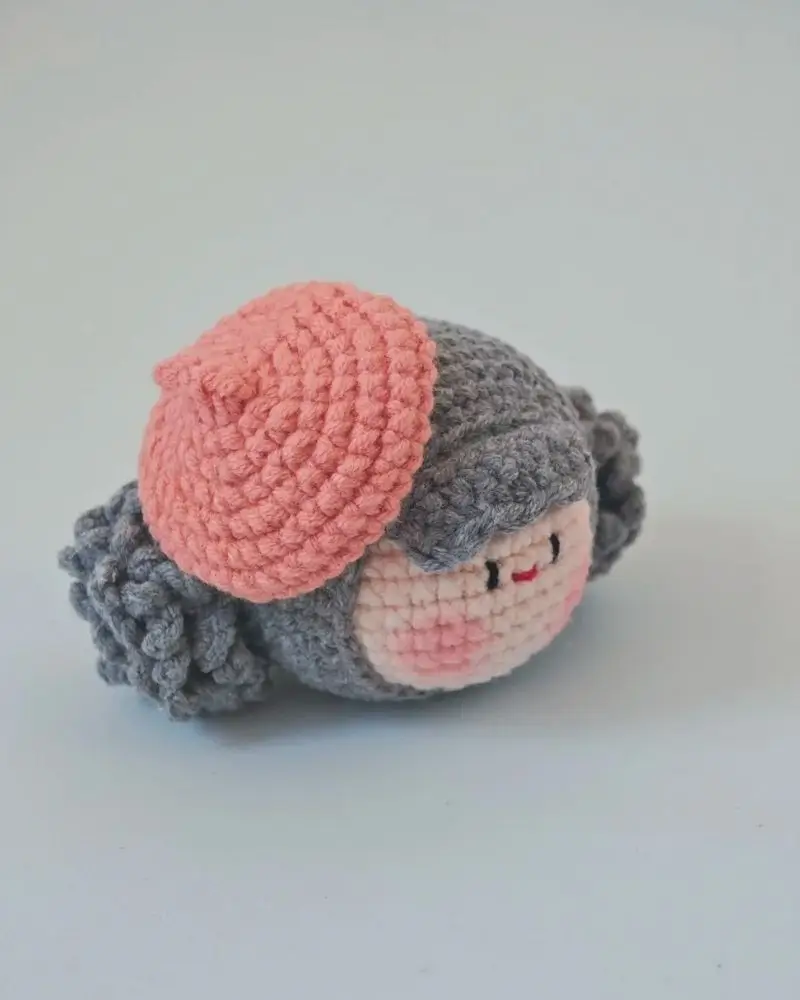Crochet doll, beret, amigurumi, gray, pink.