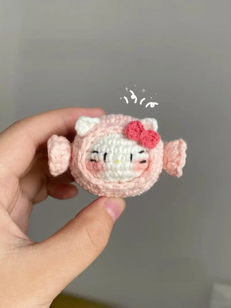 Pink crocheted Hello Kitty-style candy.