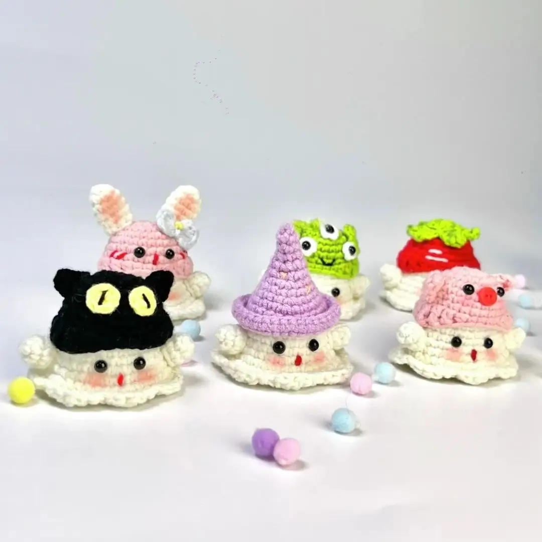 Cute crocheted cloud-shaped characters, various designs.