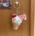 Crocheted ice cream cone keychain, Hello Kitty design.