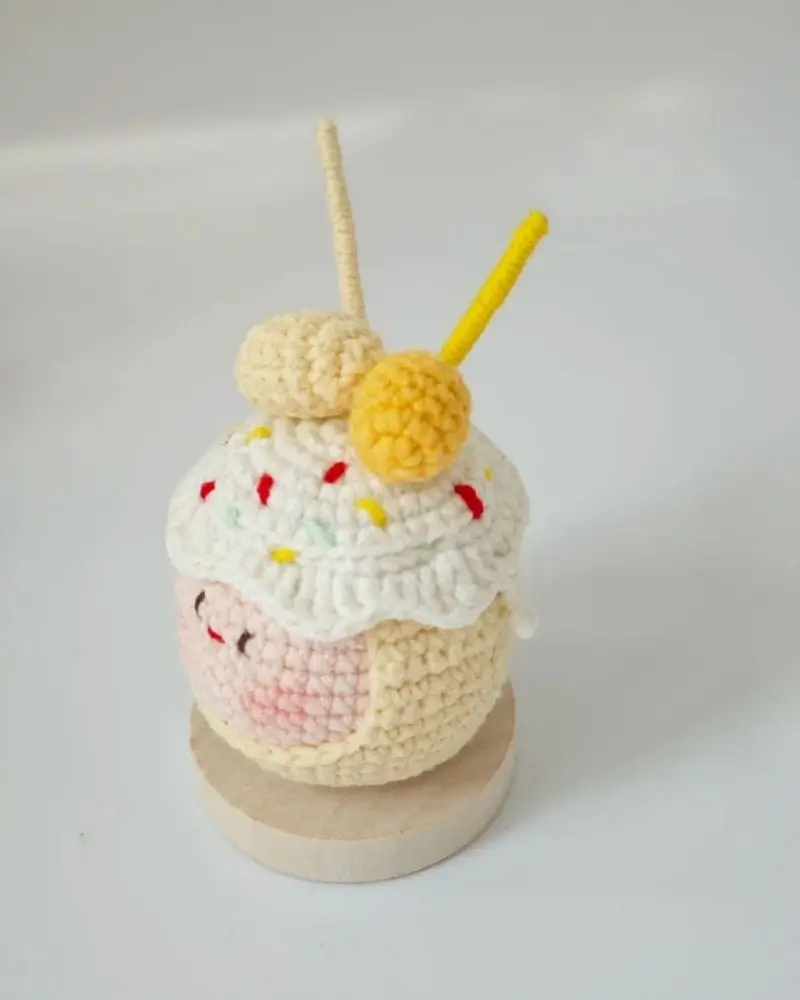 Crocheted cupcake,  sweet treat,  whipped cream, sprinkles.