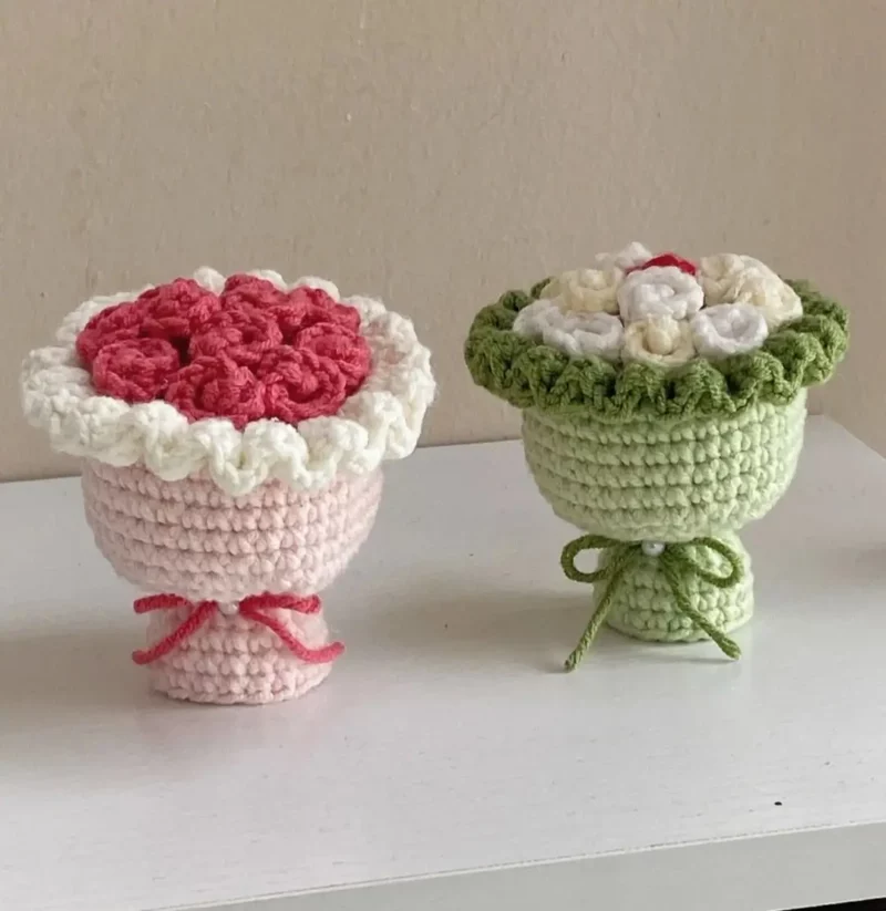 Crocheted flower bouquets in pink and light green.