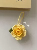 Crocheted yellow flower keychain.  Spring flower.