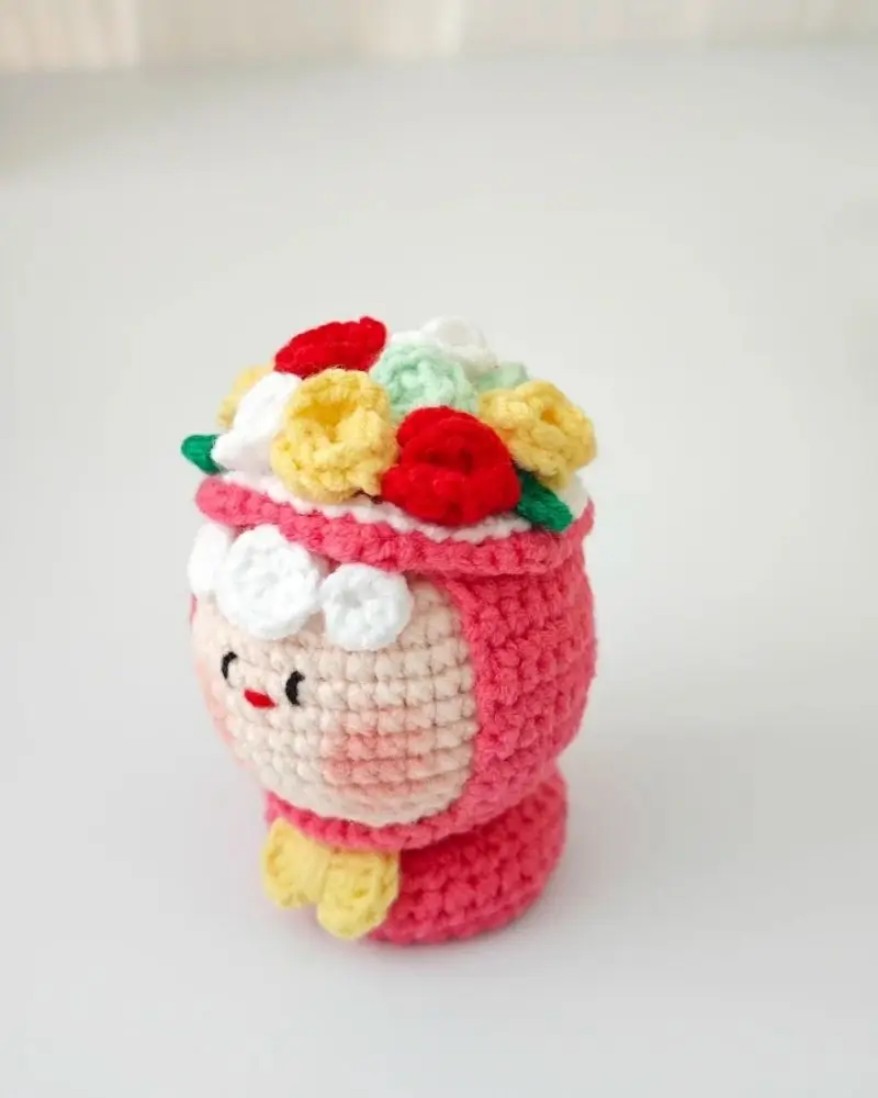 Crochet doll, floral crown, pink.