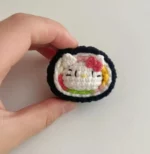 Crocheted hello kitty sushi.