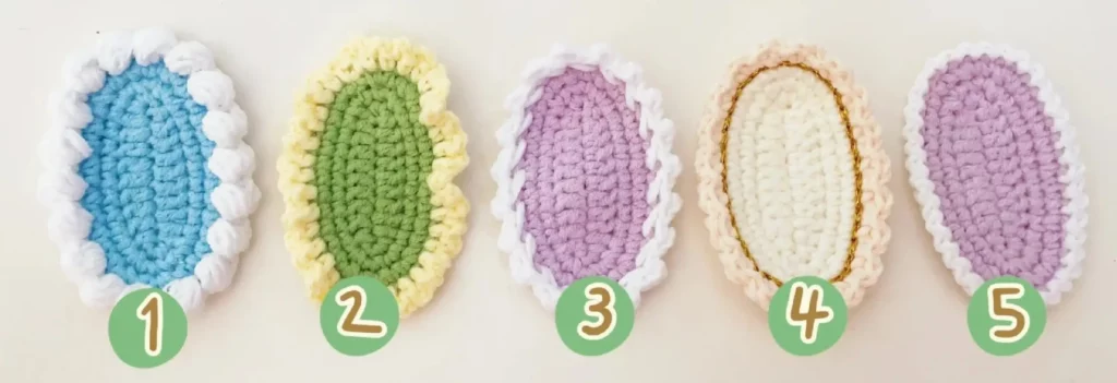 Crocheted oval shapes, various colors, numbered 1-5.