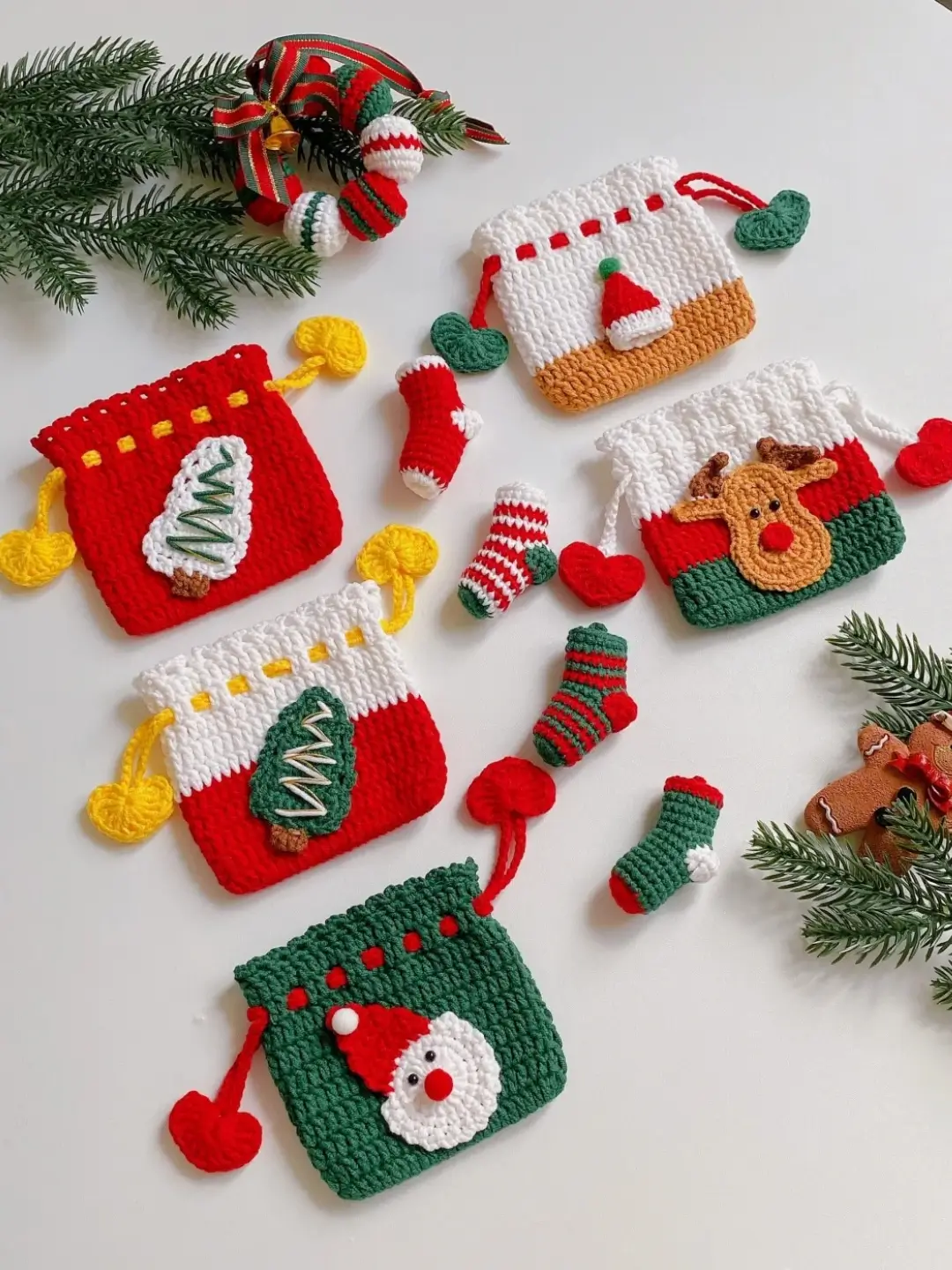 Crocheted Christmas gift pouches, various designs.