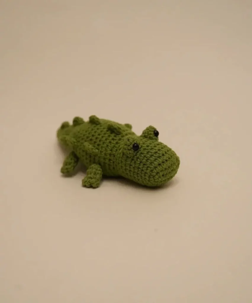 Crochet crocodile toy, green.