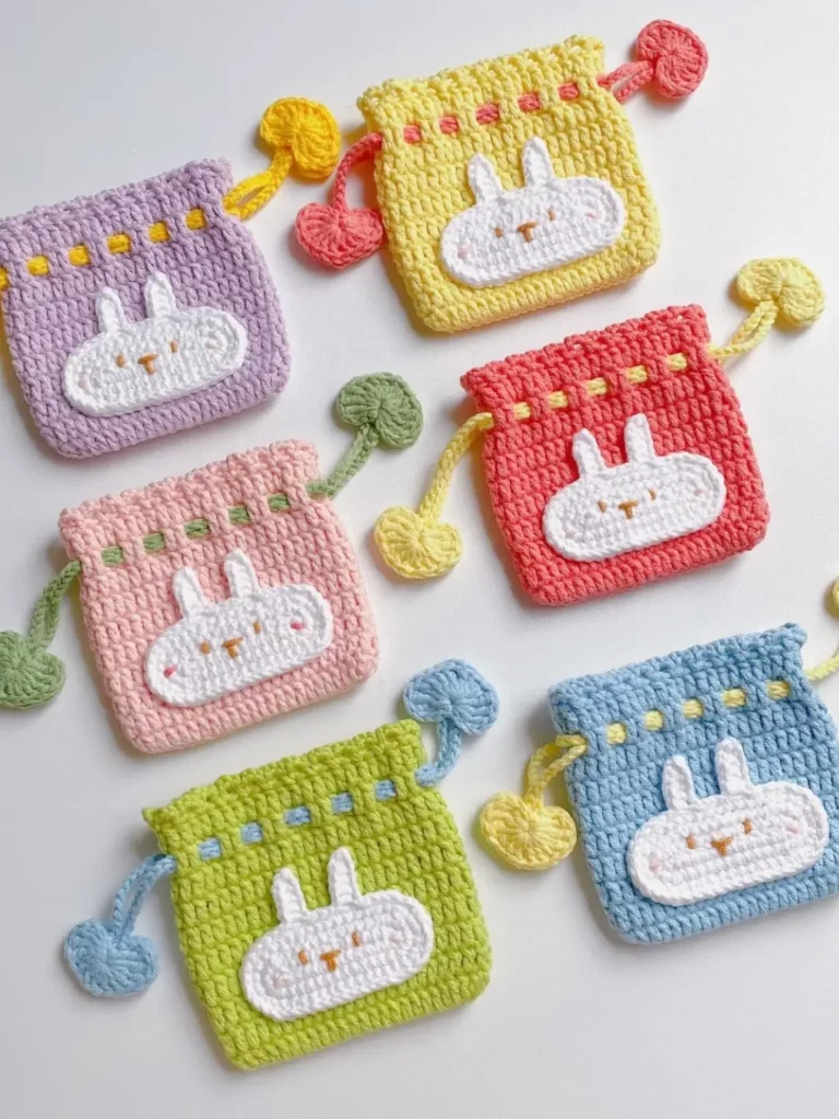 Colorful crochet bunny drawstring pouches.