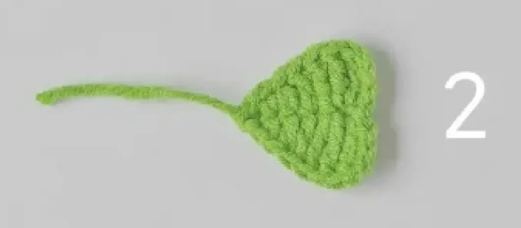 Light green crocheted leaf, step 2.