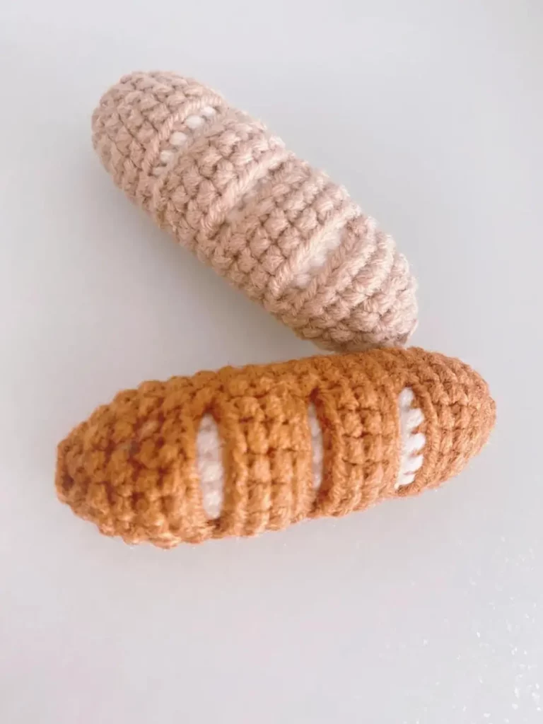 Crocheted bread, light brown and tan.