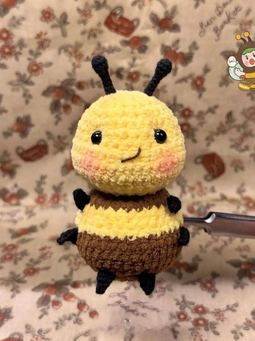 Crochet bee amigurumi, yellow and brown.