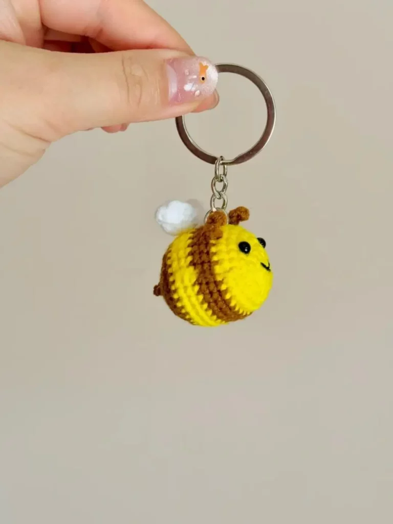 Crochet bee keychain, yellow and brown.