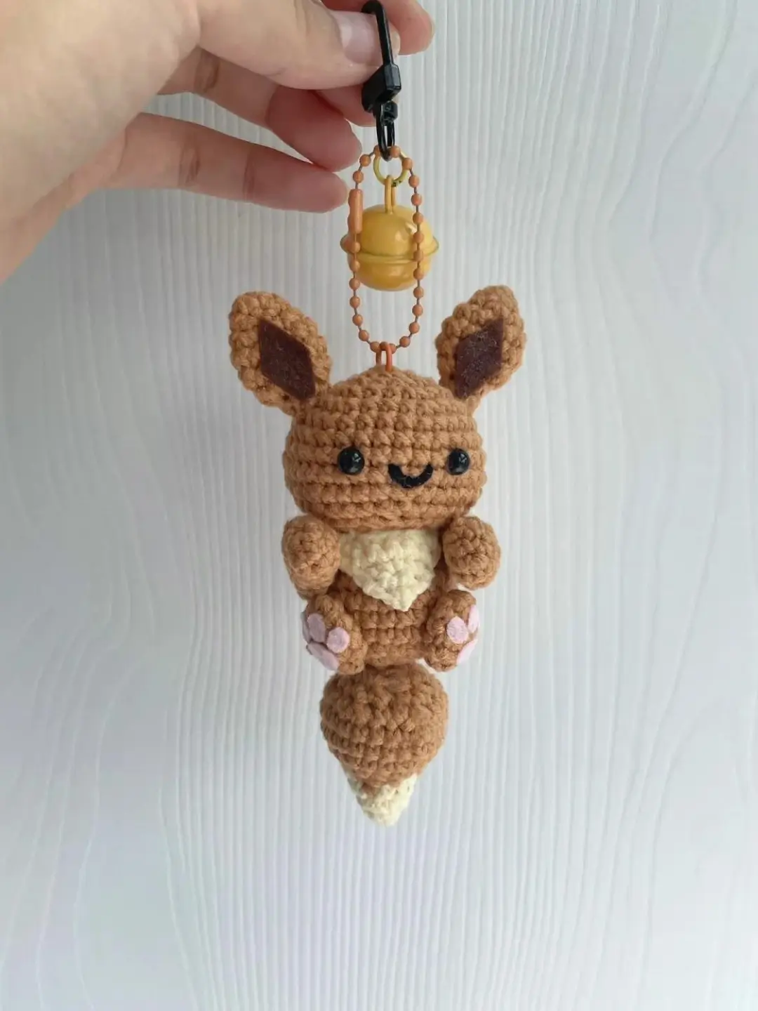 Cute crocheted  Eevee keychain.