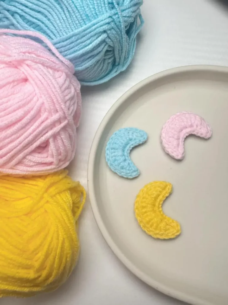 Crochet moons, yarn balls.