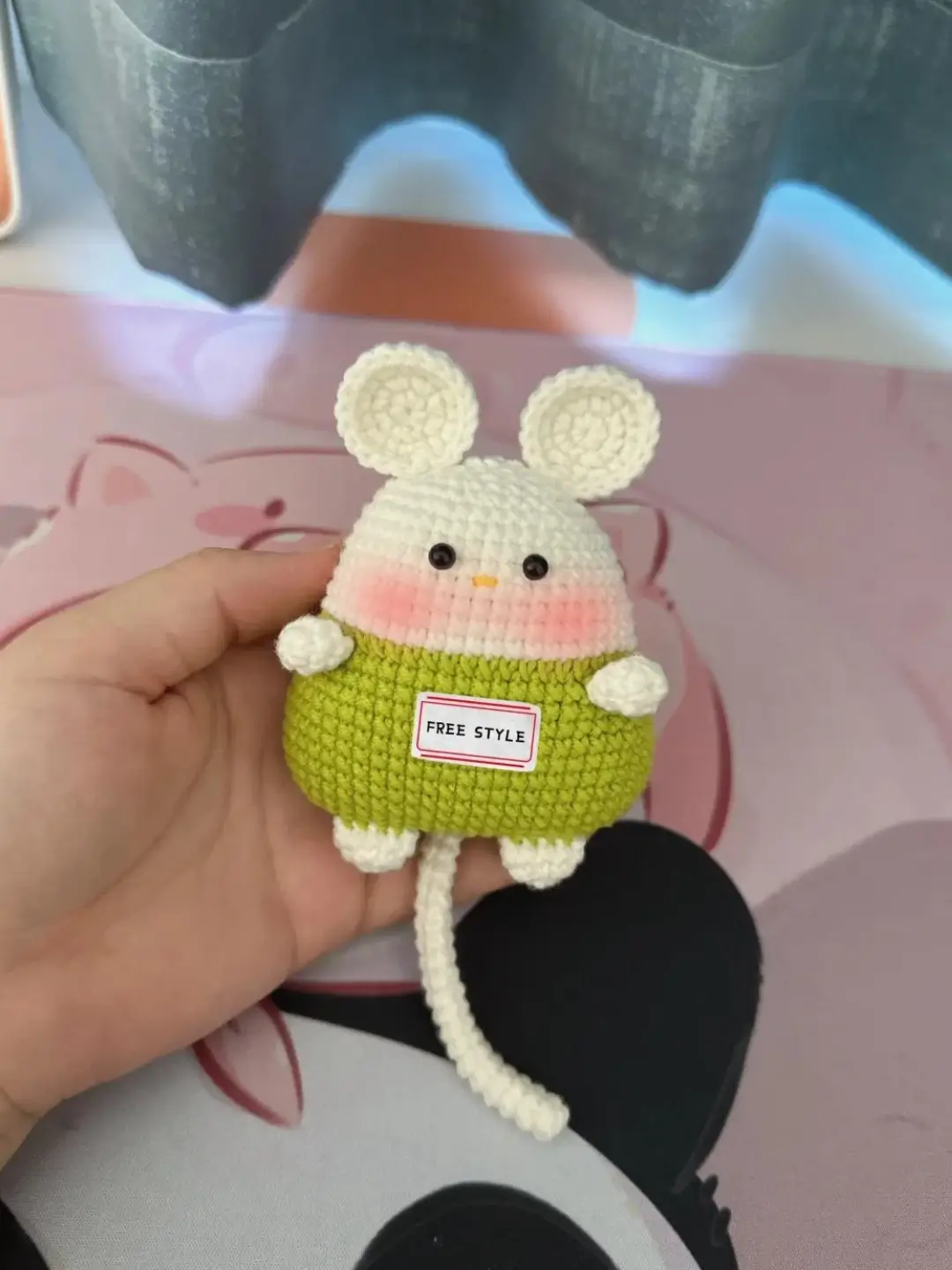 Crocheted mouse, light beige, lime green,  "FREE STYLE" label.