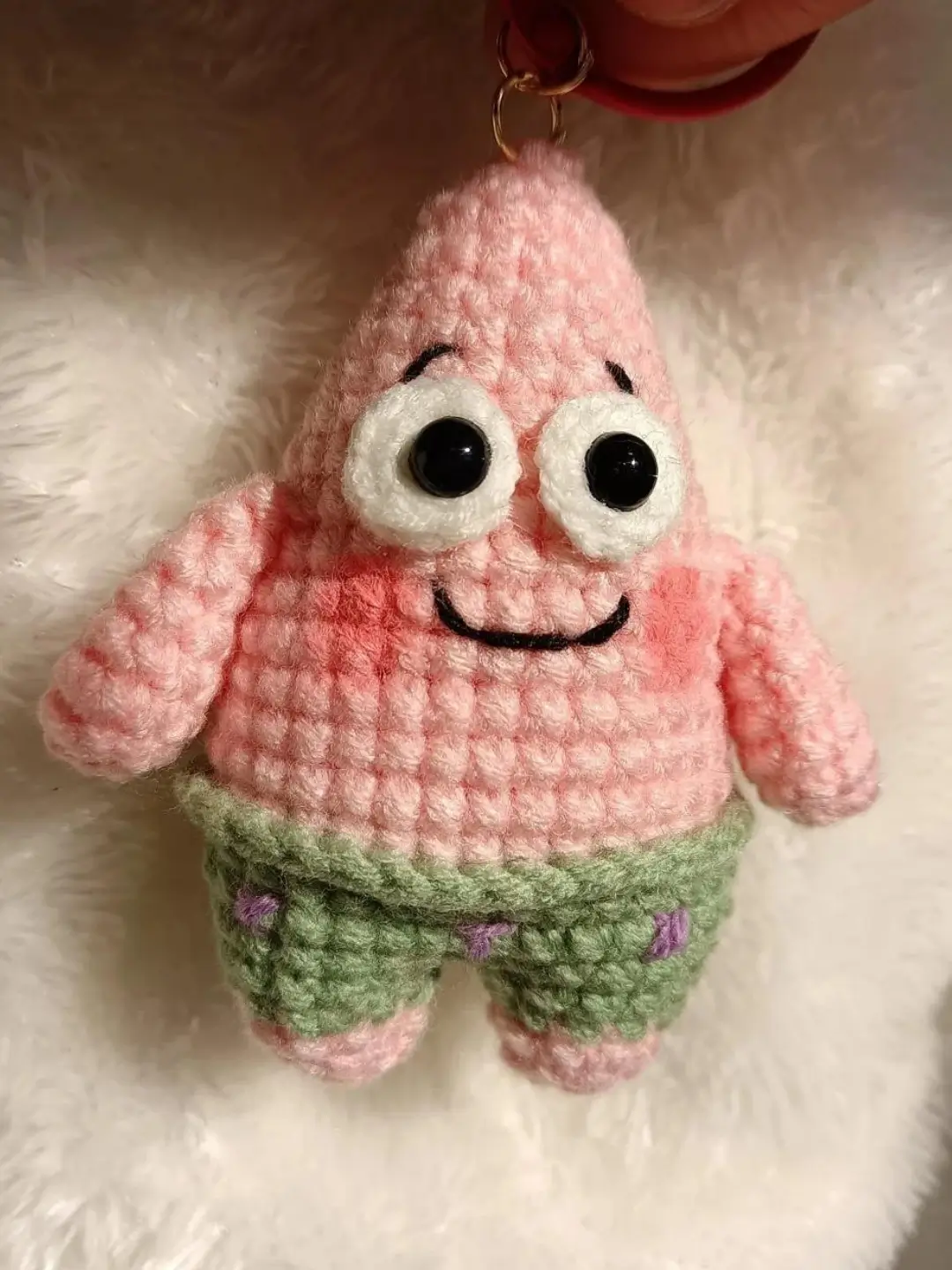Crocheted Patrick Star keychain.
