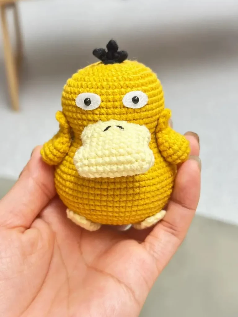 Cute yellow amigurumi Jigglypuff.