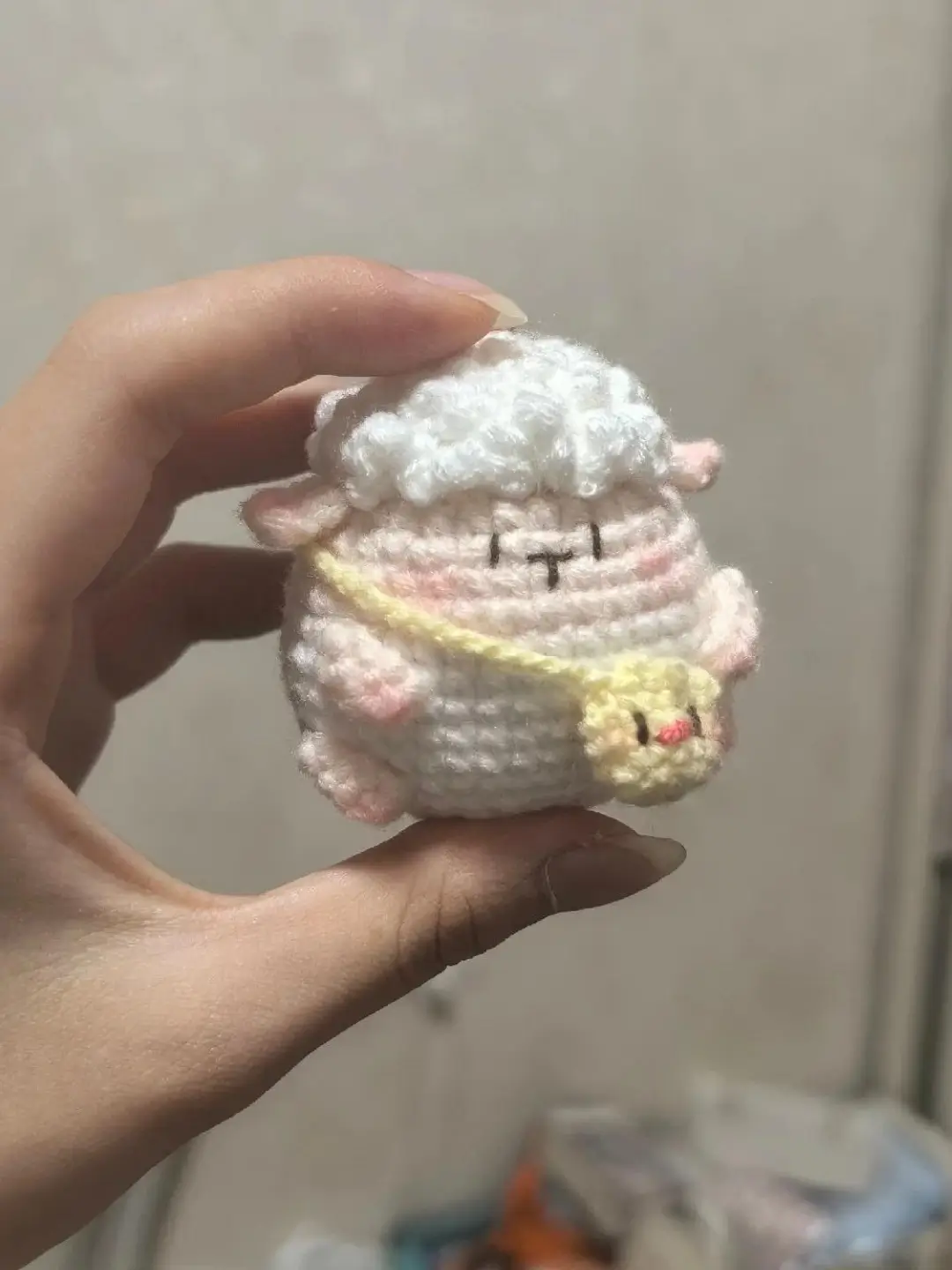 Cute crocheted sheep keychain.