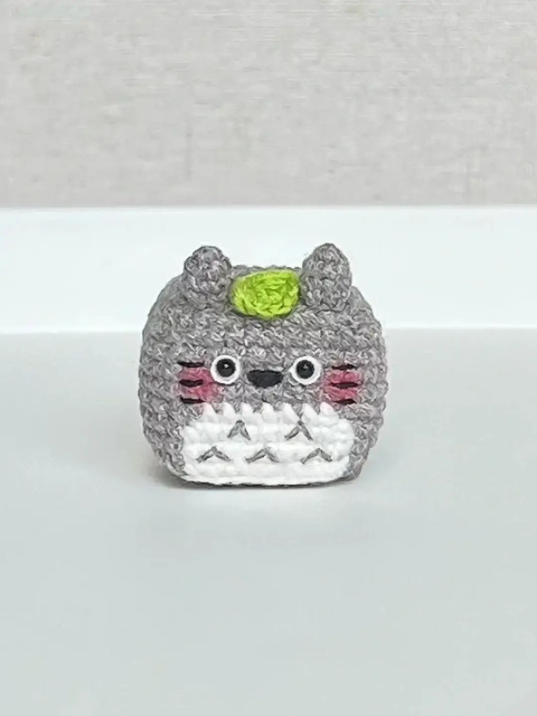 Cute gray crochet Totoro amigurumi.