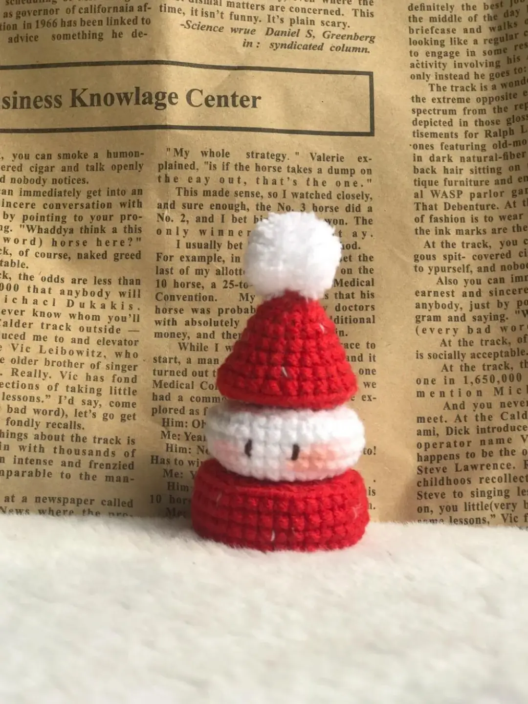 Crocheted Santa Claus figurine.